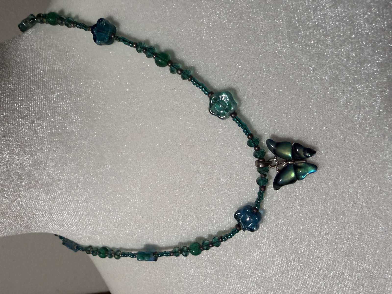Blue-green butterfly necklace and earring set