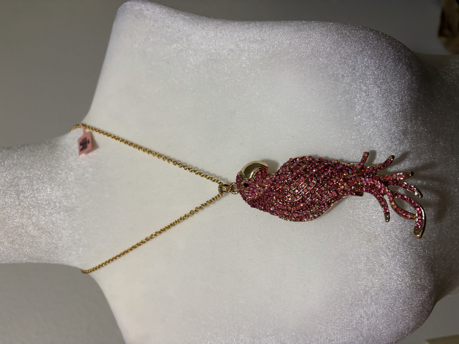 Pink bird pendant necklace