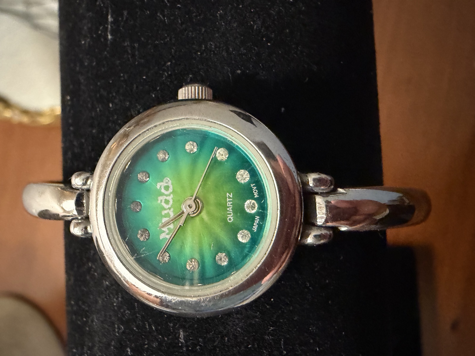 Mudd green dial silver-tone bracelet watch