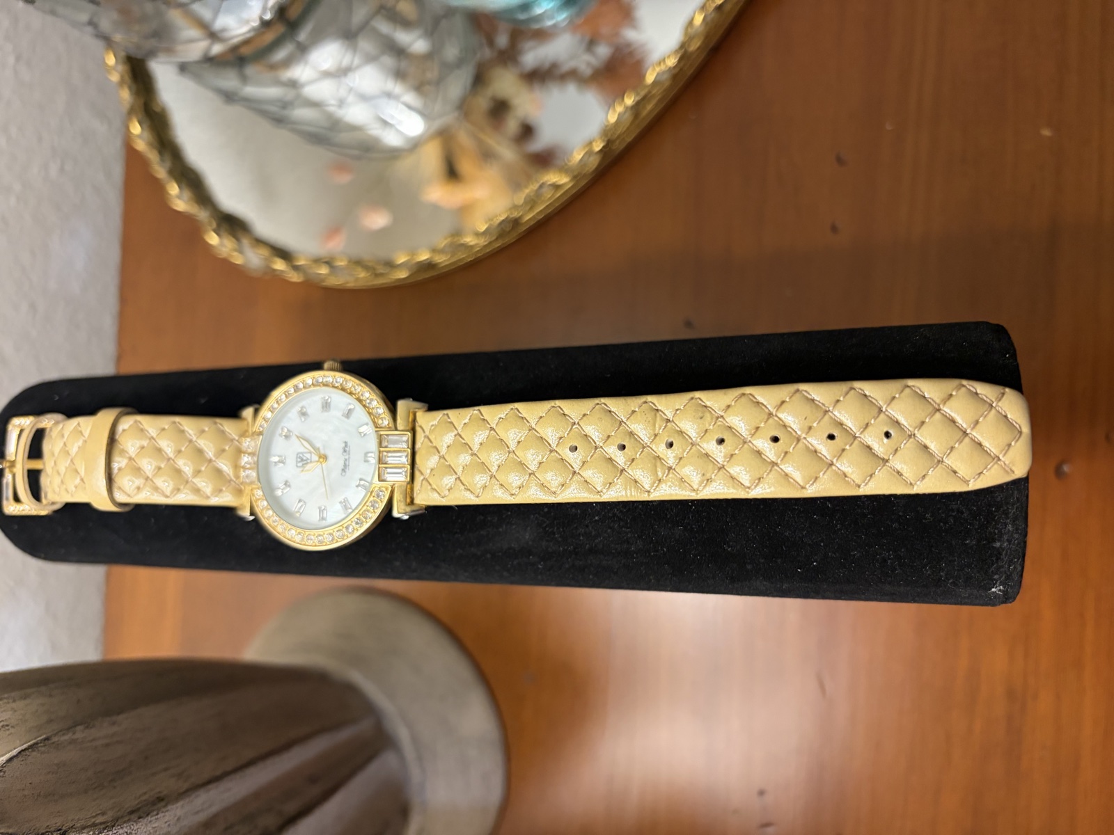 Front view of Victoria Wieck B9015 watch with quilted cream leather strap and gold-tone round case
