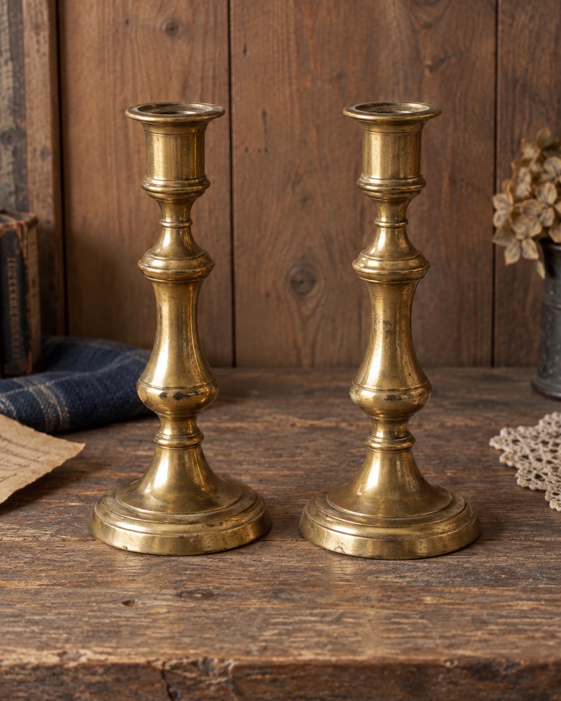 Matched pair of aged brass candlesticks with a mellow patina